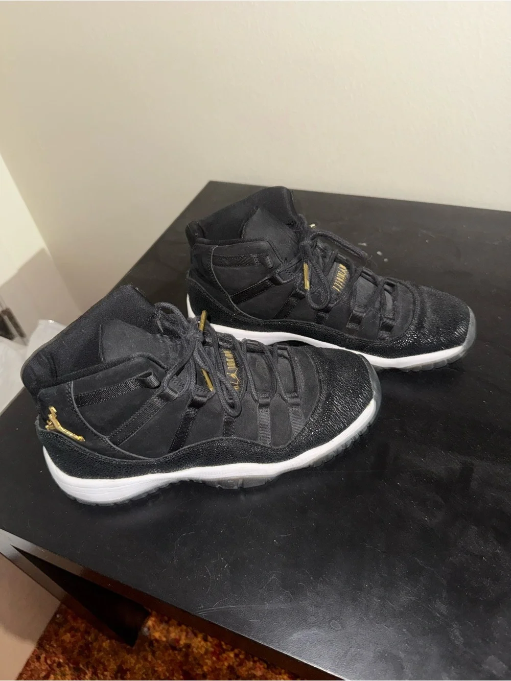 Jordan Black and Gold High-Top Sneakers